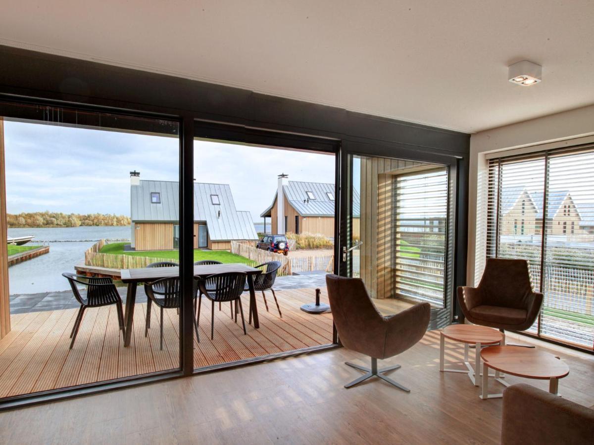 Modern Lodge On The Water In A National Park Tholen Exterior photo